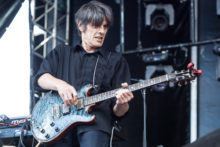 Guitarist Stuart Fraser of Noiseworks performs as part of the Red Hot Summer tour in Mornington at the Mornington Racecourse on 23 January 2016. Photo by Ros O'Gorman