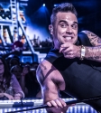 Robbie Williams photo by Mary Boukouvalas