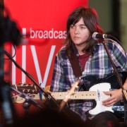 Courtney Barnett performs in the ABC Melbourne Studio Foyer celebrating the 25th Anniversary of the Archie Roach album Charcoal Road. Photo by Ros O'Gorman