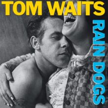 Tom Waits during the Rain Dogs era in 1985 – celebrating the 40th anniversary of his groundbreaking album.