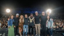 Brantley Gilbert with BBR Music Group and BMG Nashville executives on stage during The Tattoos Tour in Nashville