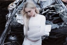 Erin LeCount performing in a derelict room from the Machine Ghost music video, photo by Furmaan Ahmed.