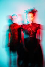 Morcheeba performing live with Skye Edwards and Ross Godfrey on stage celebrating 30 years of music.