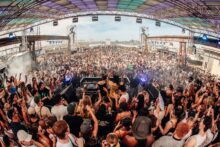 Crowd at Sugar Mountain festival in Melbourne with 360-degree stage lighting.