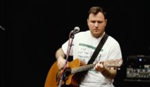 Chad Gilbert of New Found Glory performing on guitar