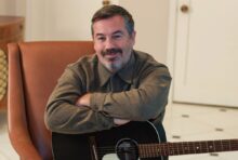 Duncan Sheik performing with guitar during his career as a singer-songwriter and composer