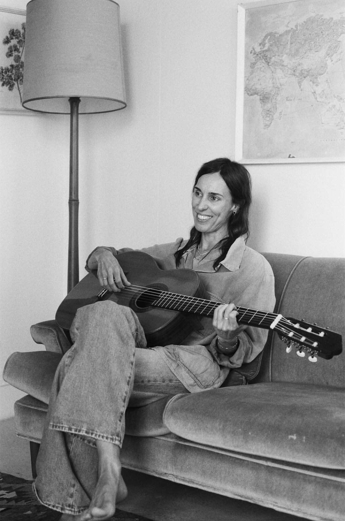 Holly Throsby performing live with guitar