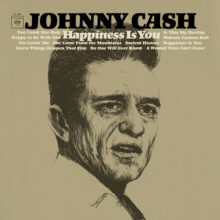 Johnny Cash performing during the 1960s, marking the era of his 1966 album Happiness Is You.