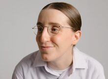 Robby Hoffman performing stand-up comedy during her 2027 Australia and New Zealand tour