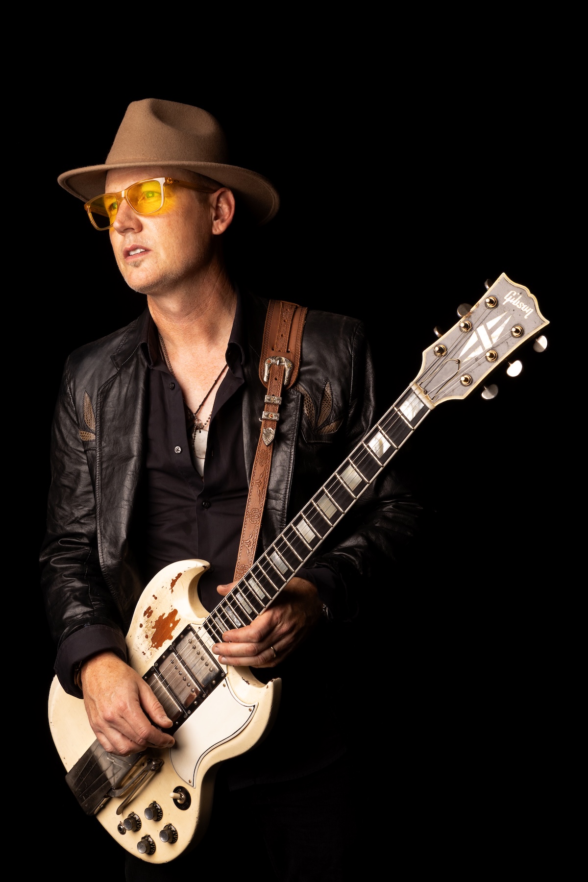 Matty T Wall performing on electric guitar, ahead of the release of his single Tornado Of Love.