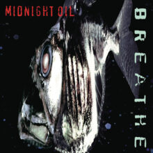 Midnight Oil performing live during the era of their 1996 album Breathe